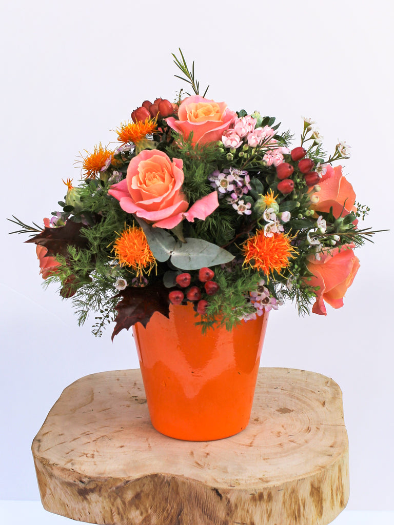 Orange artificial flower arrangements shop